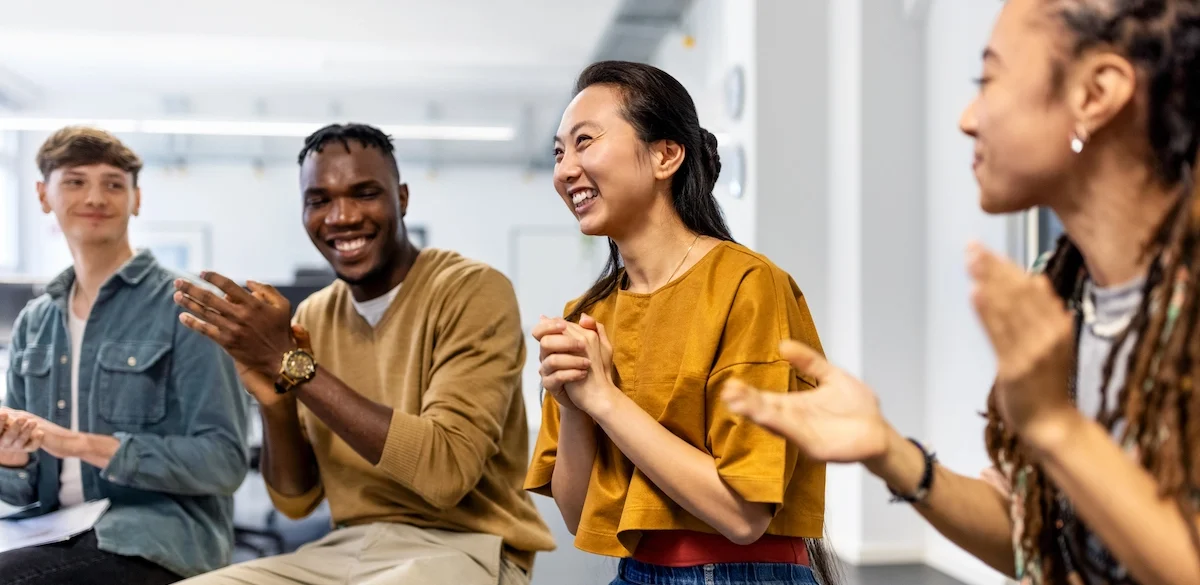 colleagues applauding and are greatful